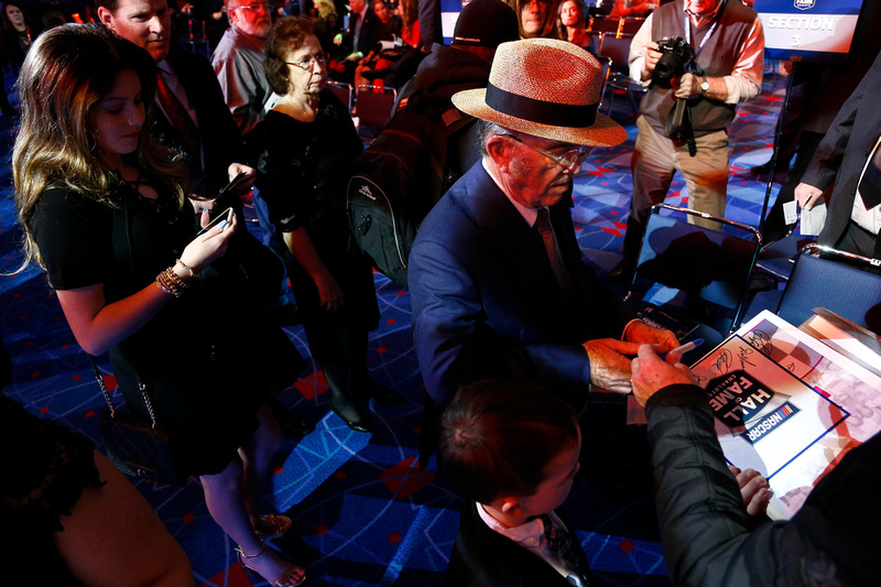 Jack Roush signs autograph for fans.